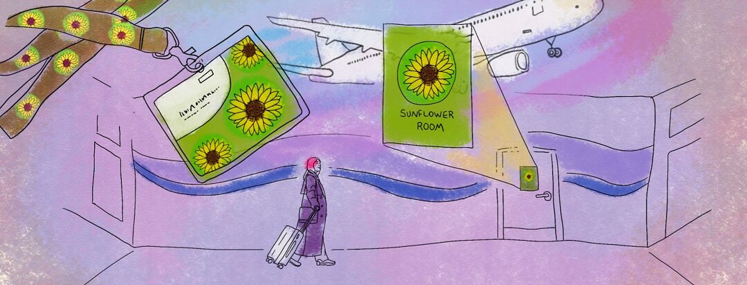 A woman walking in an airport with a sunflower sign emphasized in front of her and a sunflower lanyard in the space above